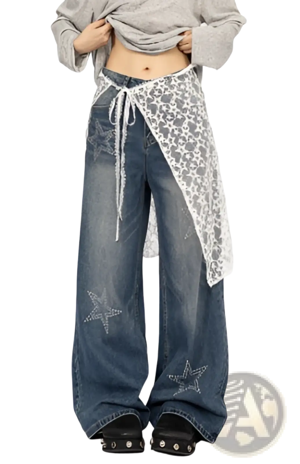 Blue denim wide-leg jeans with silver star embellishments and a sheer white lace panel tied at the waist