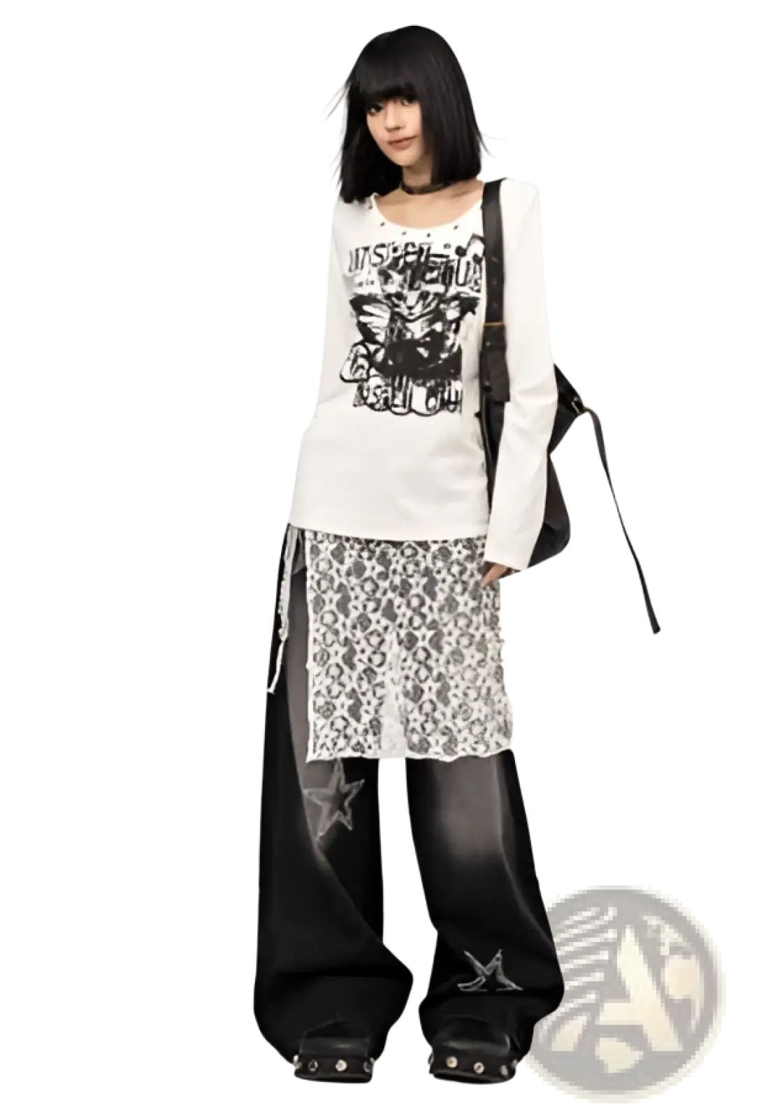 Black star-patterned wide-leg jeans with sheer lace overlay paired with studded footwear visible from the front
