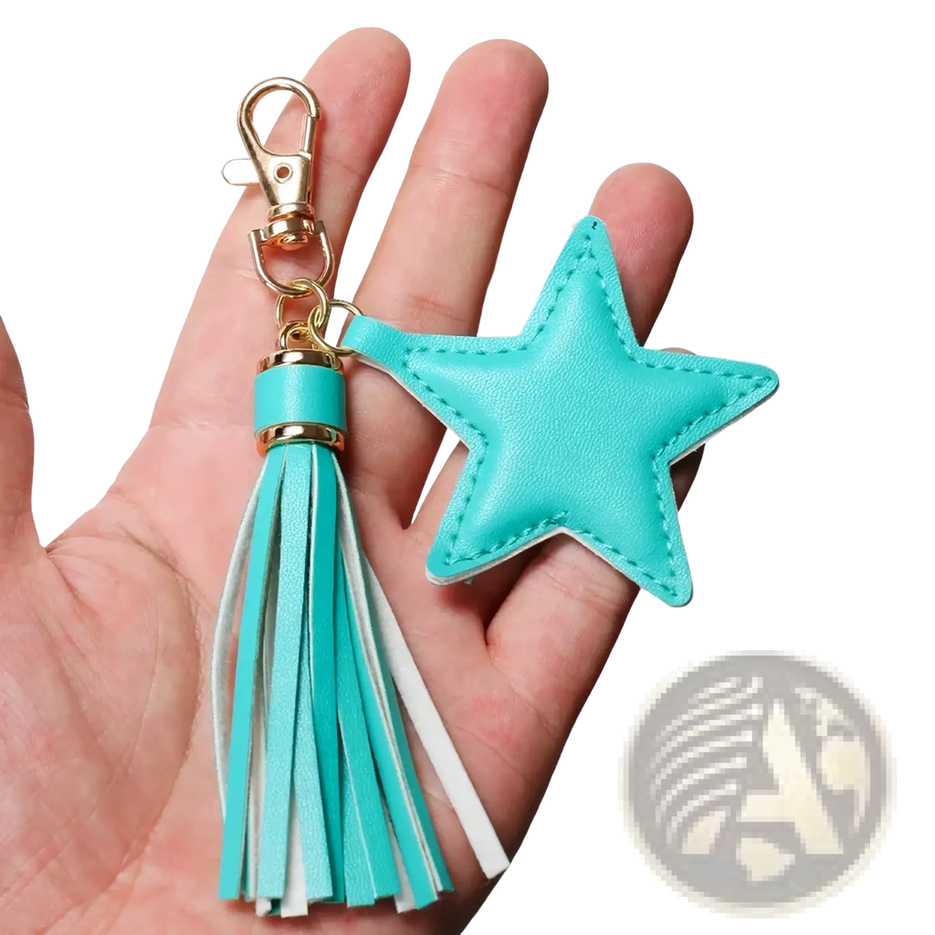 Turquoise star leather tassel keychain for women featuring a star shape and alternating turquoise and white fringe tassel