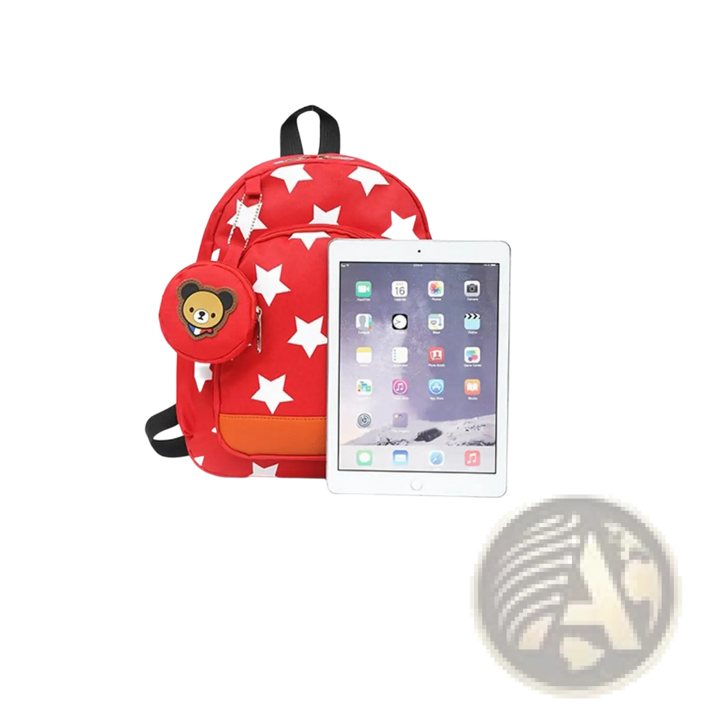 Red star-patterned children’s soccer backpack with orange accent panel and plush bear coin purse charm
