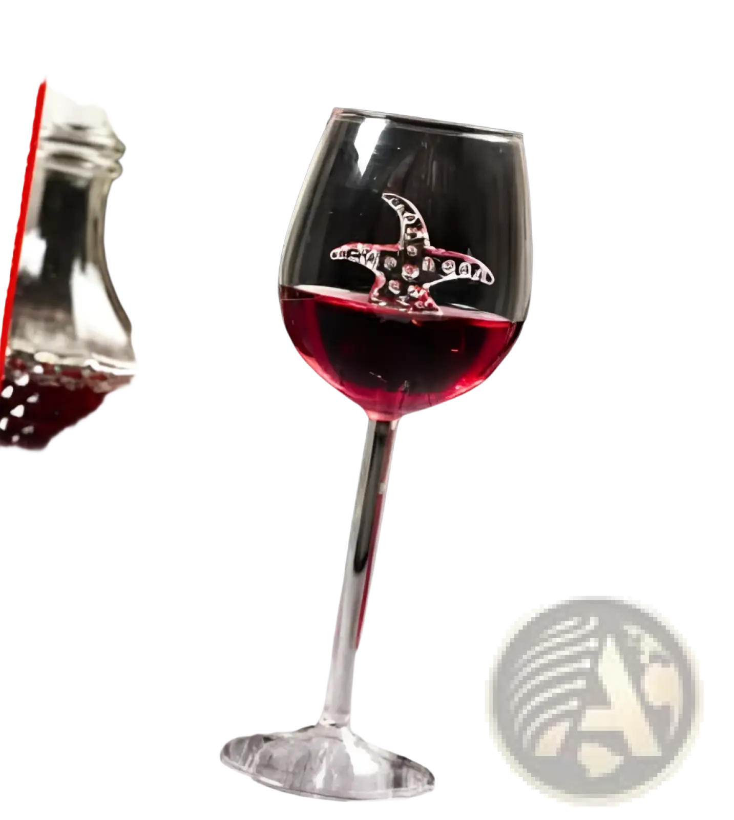 A clear crystal red wine glass 400ml with a delicate starfish design etched, filled halfway with red wine