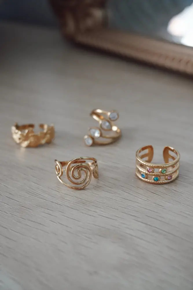 Starlight 18k gold pvd stainless steel toe ring set in gold tone with intricate designs and colorful zirconia accents