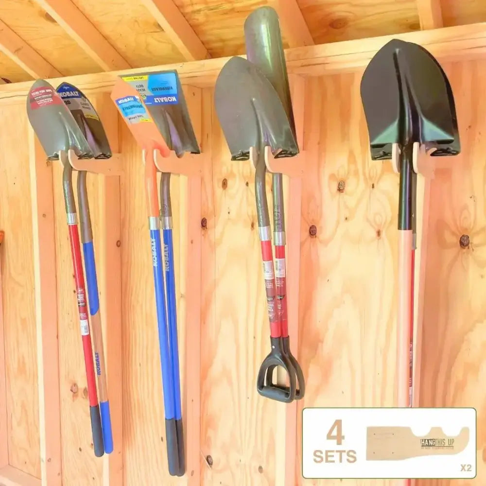 Four black metal shovel handles with red and blue shafts hang on wooden rack in starter shed kit stud mount tool organizer system
