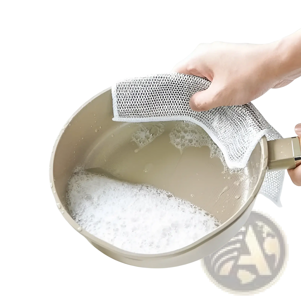 Gray steel wire dishcloth mesh kitchen scrubber with white border cleaning a pot in soapy water 20x20cm