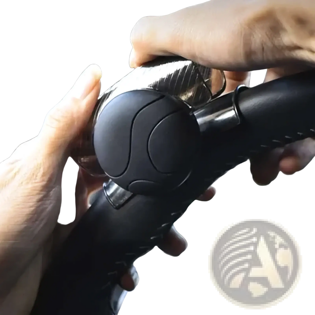 Black and silver carbon fiber steering wheel spinner knob grip with textured ergonomic design for 360 degree turn assist
