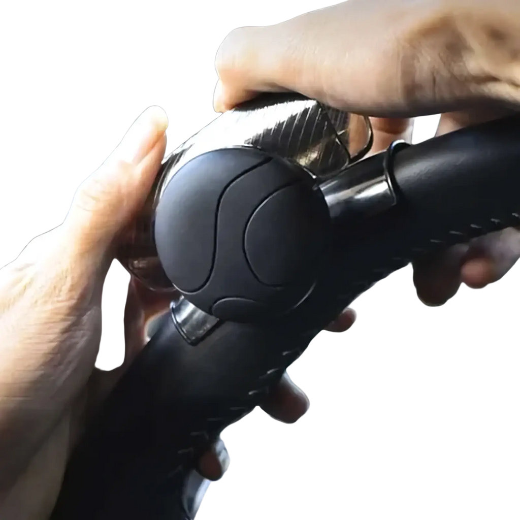Black and silver carbon fiber steering wheel spinner knob grip with textured ergonomic design for 360 degree turn assist