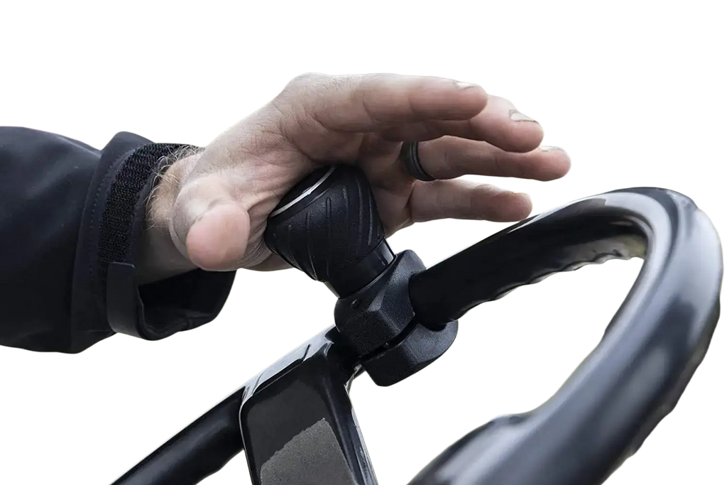 Black rubberized steering wheel spinner knob with textured surface and ergonomic grip for comfortable control