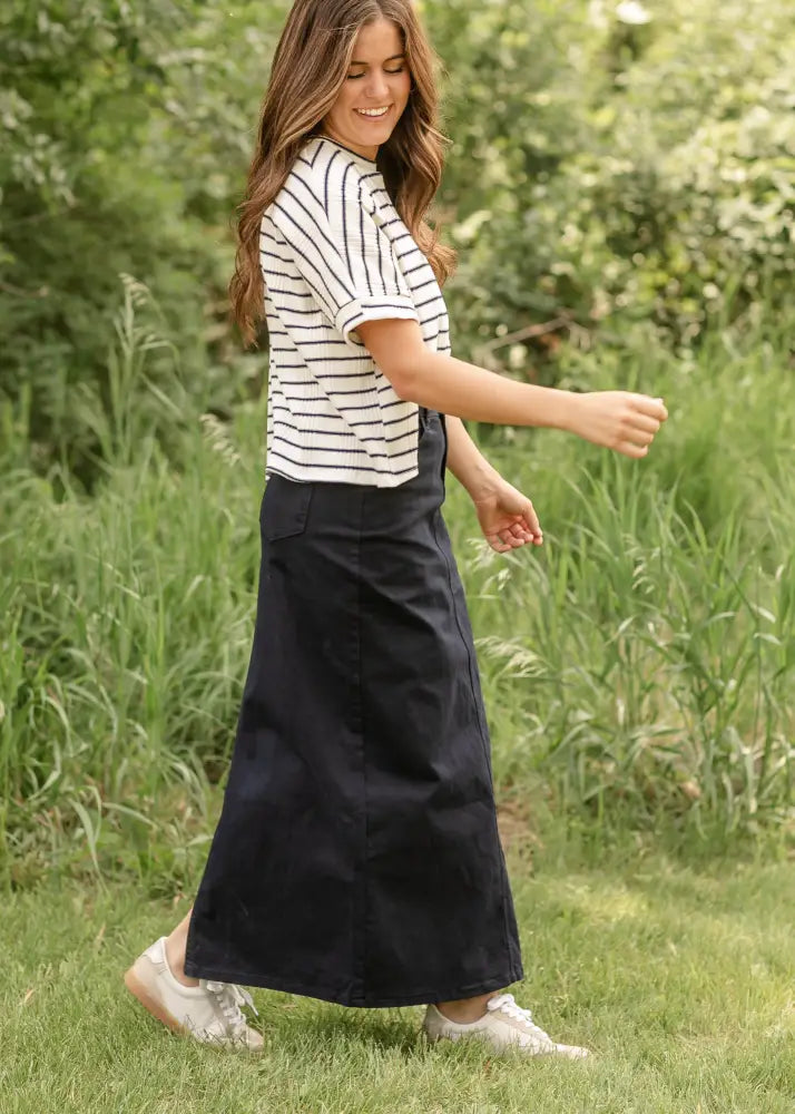 Stella navy embroidered maxi denim skirt in navy blue featuring a front pocket and subtle stitching details