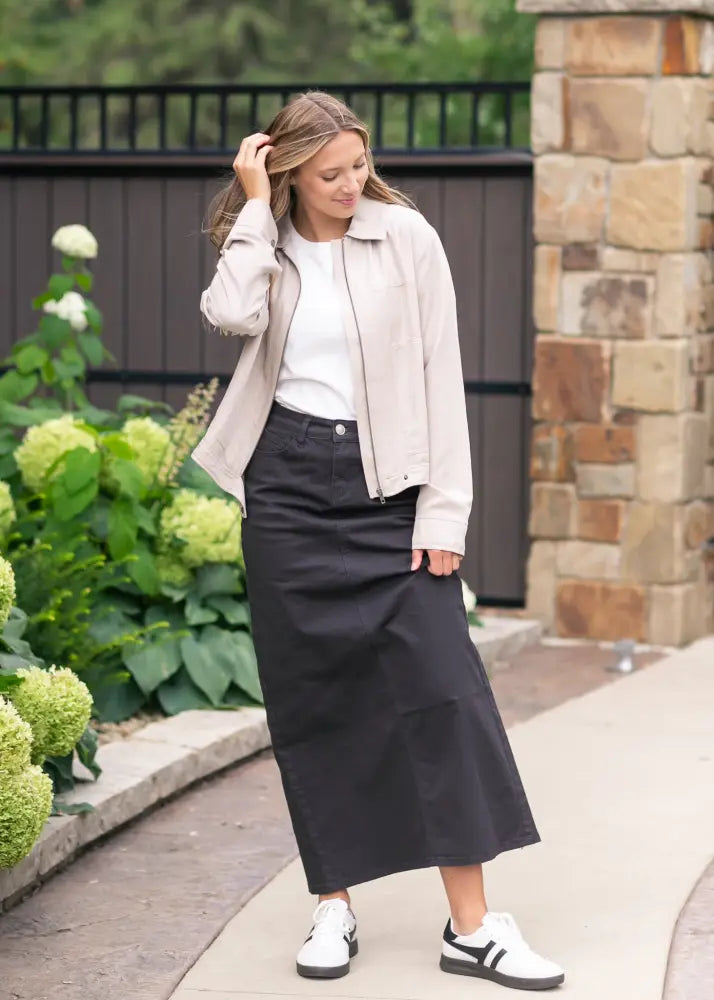Stella Onyx black high waisted denim midi skirt with a straight cut and subtle side seam detailing