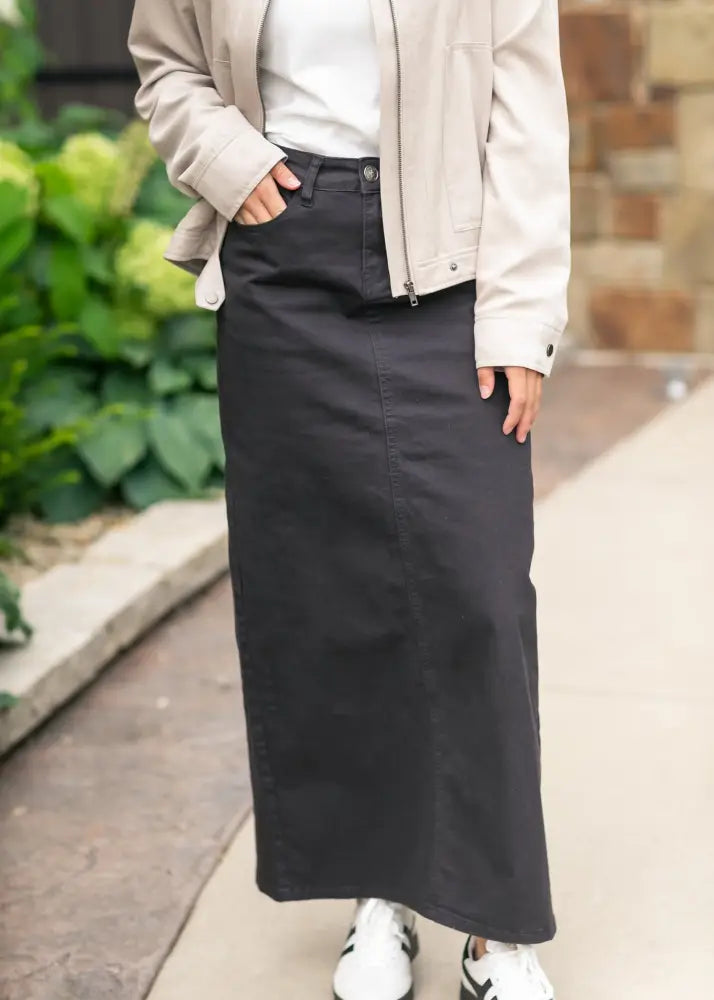 Stella Onyx black high waisted denim midi skirt with a straight cut and front pockets for versatile wear