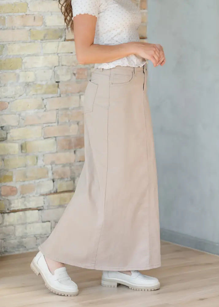 Beige linen midi skirt with straight cut and two front pockets styled like stella simply taupe denim high waisted maxi skirt