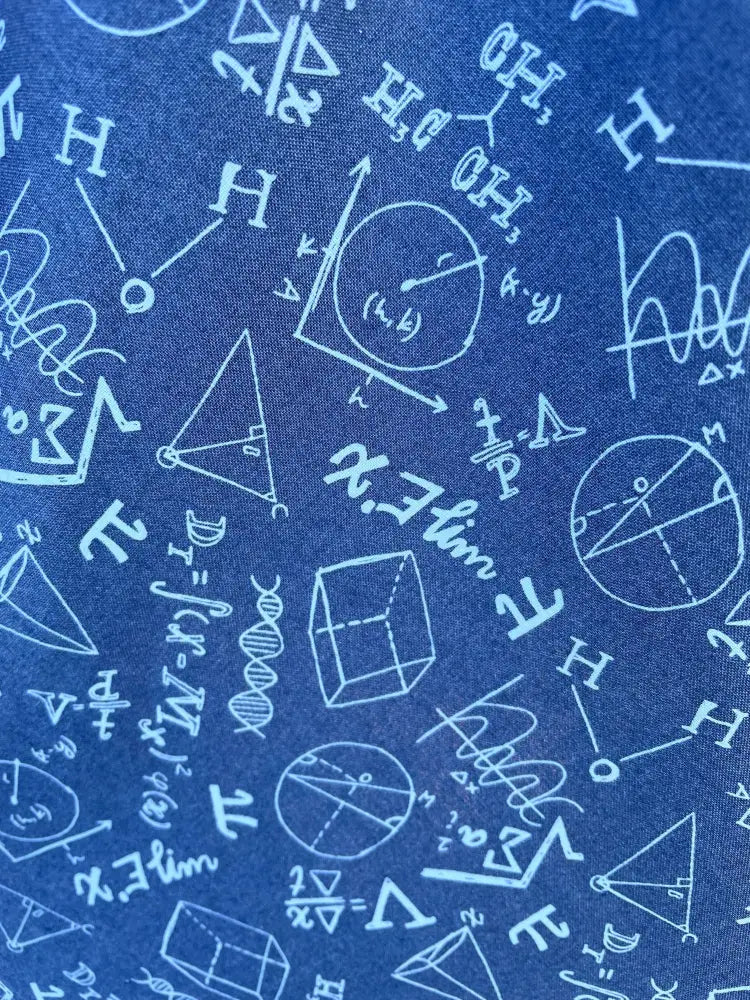 Stem print navy lace bow top featuring blue fabric with white scientific symbols and mathematical equations pattern