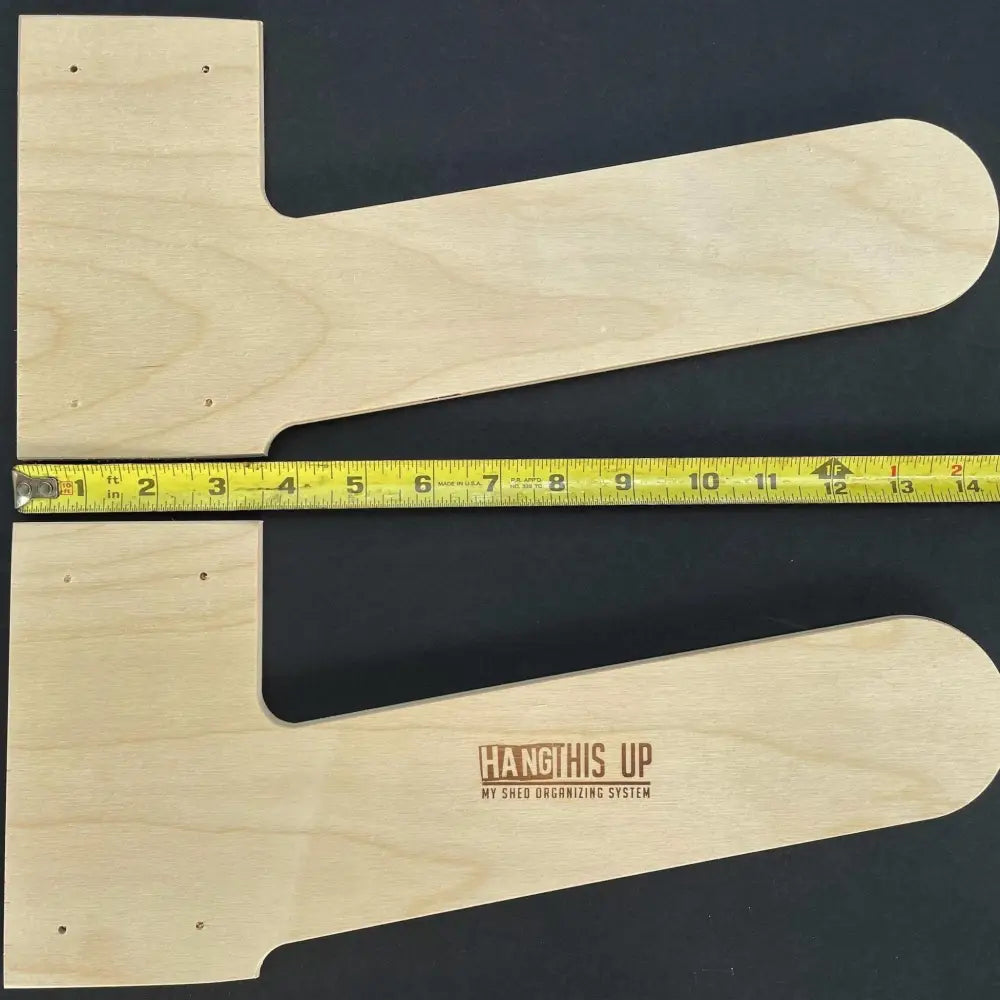 Light-colored wooden l-shaped shelf supports with engraved branding on the heavy duty birch plywood dual step ladder wall rack