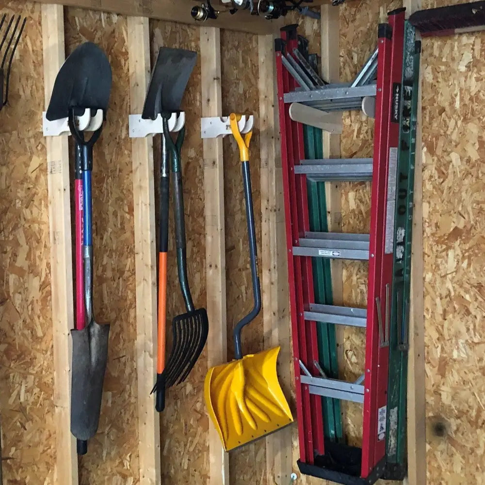 Heavy duty birch plywood dual step ladder wall rack holding a red and green extension ladder with silver rungs