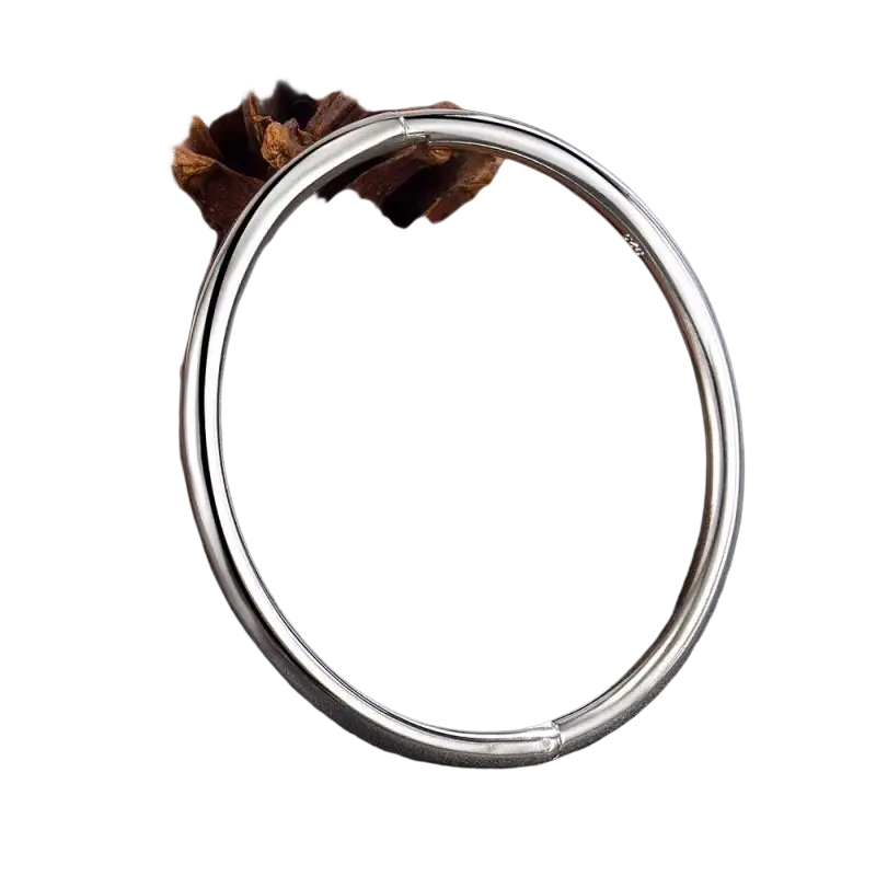 Sterling silver 4mm bangle bracelet for women with a sleek silver tone and smooth polished finish with hinge closure
