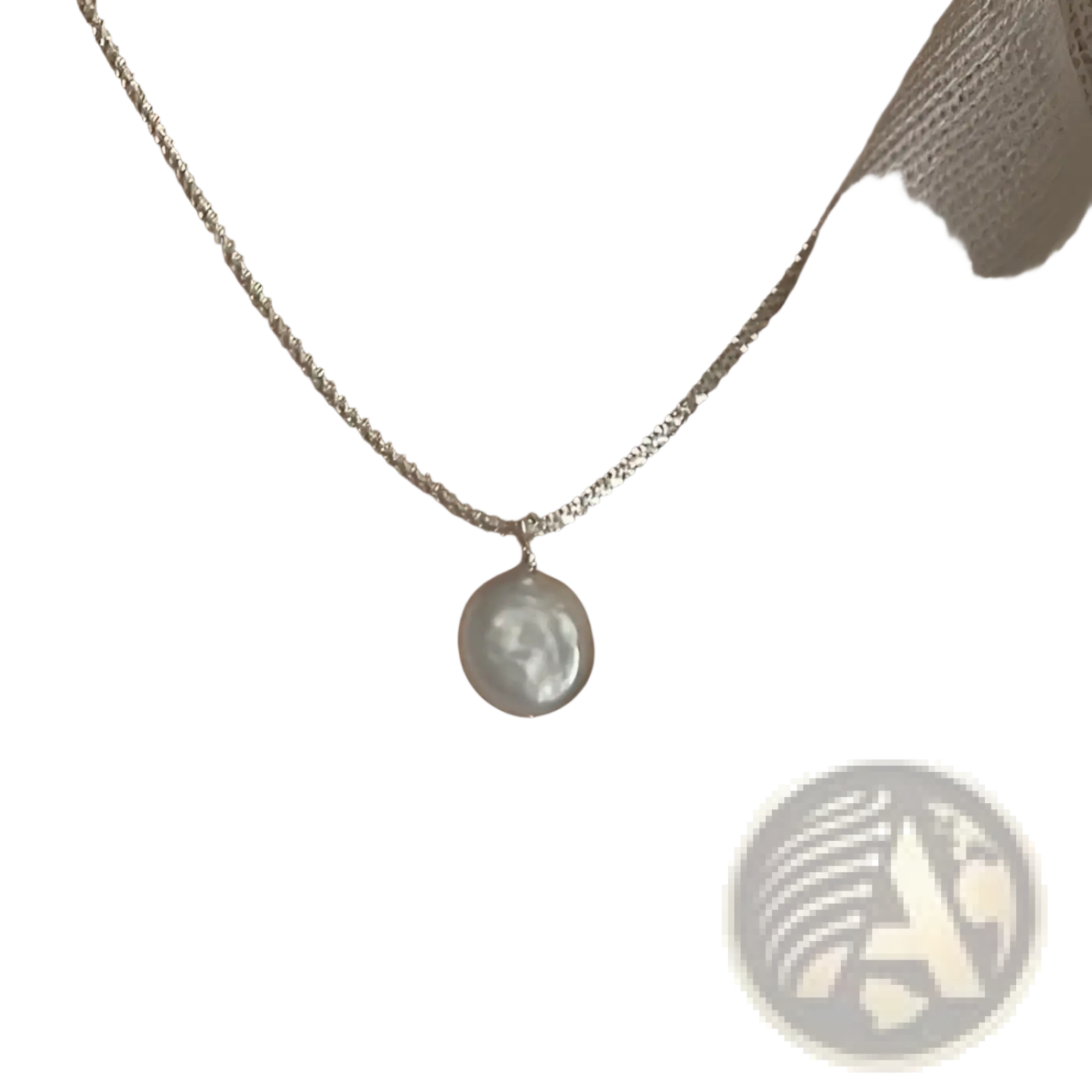 Sterling silver baroque pearl starry sky necklace with a delicate silver chain and a single white baroque pearl pendant