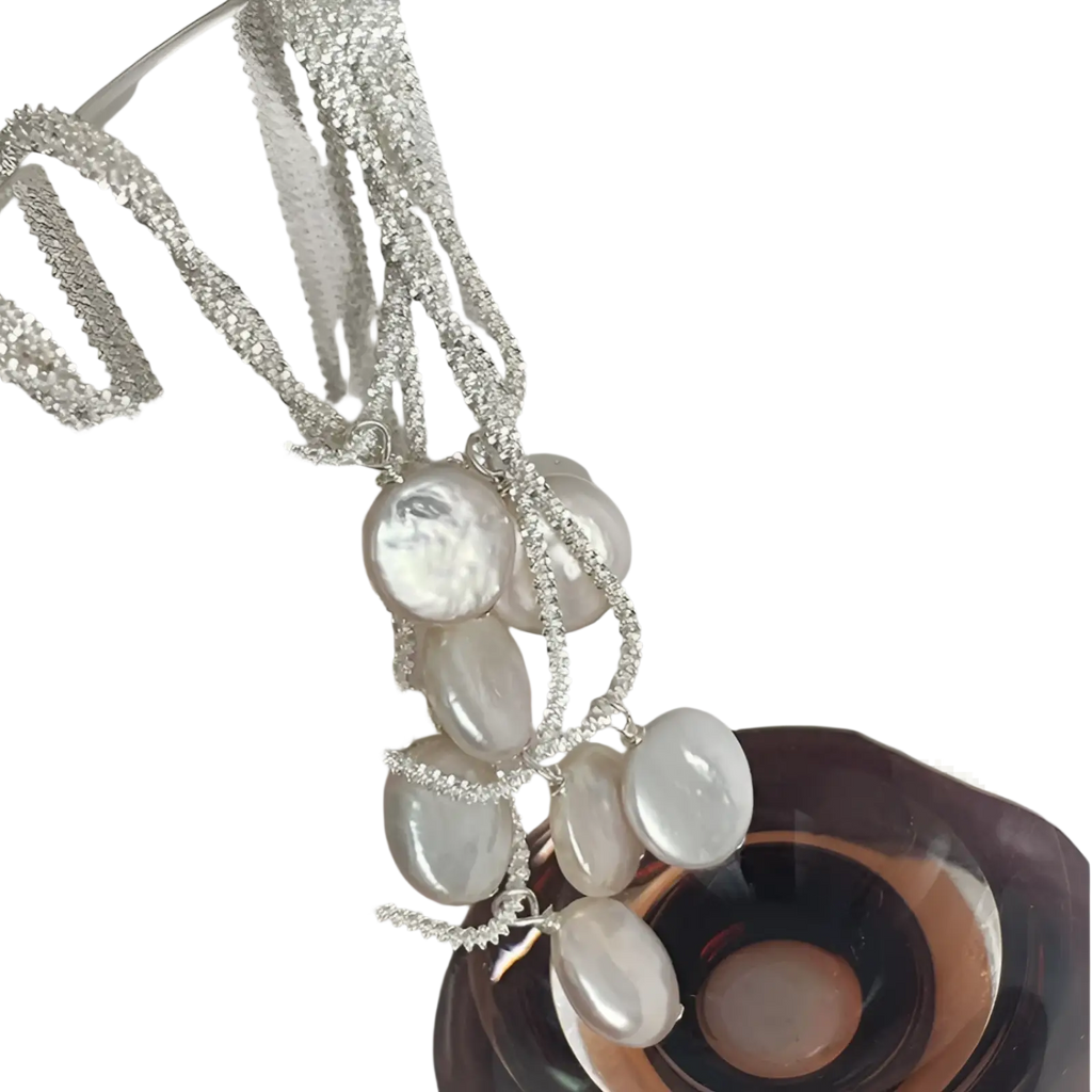 Sterling silver chain necklaces featuring lustrous white irregular baroque pearl pendants in a starry sky design