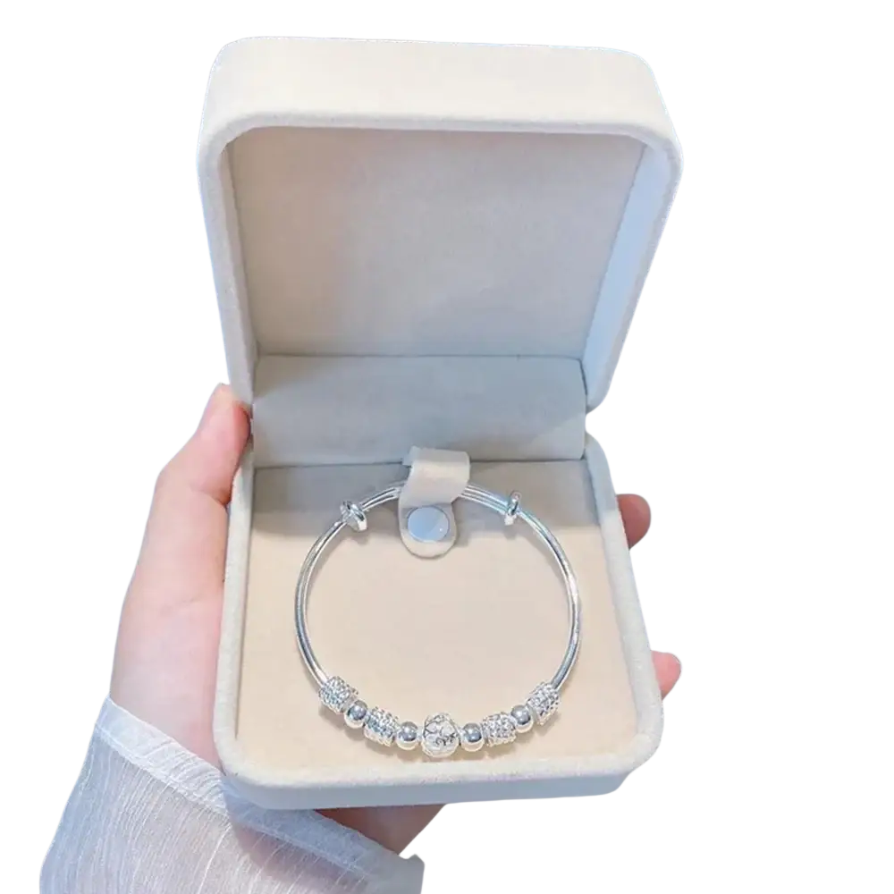 Sterling silver beaded bangle bracelet with crystal-encrusted beads and charm ideal as an exquisite party gift for women