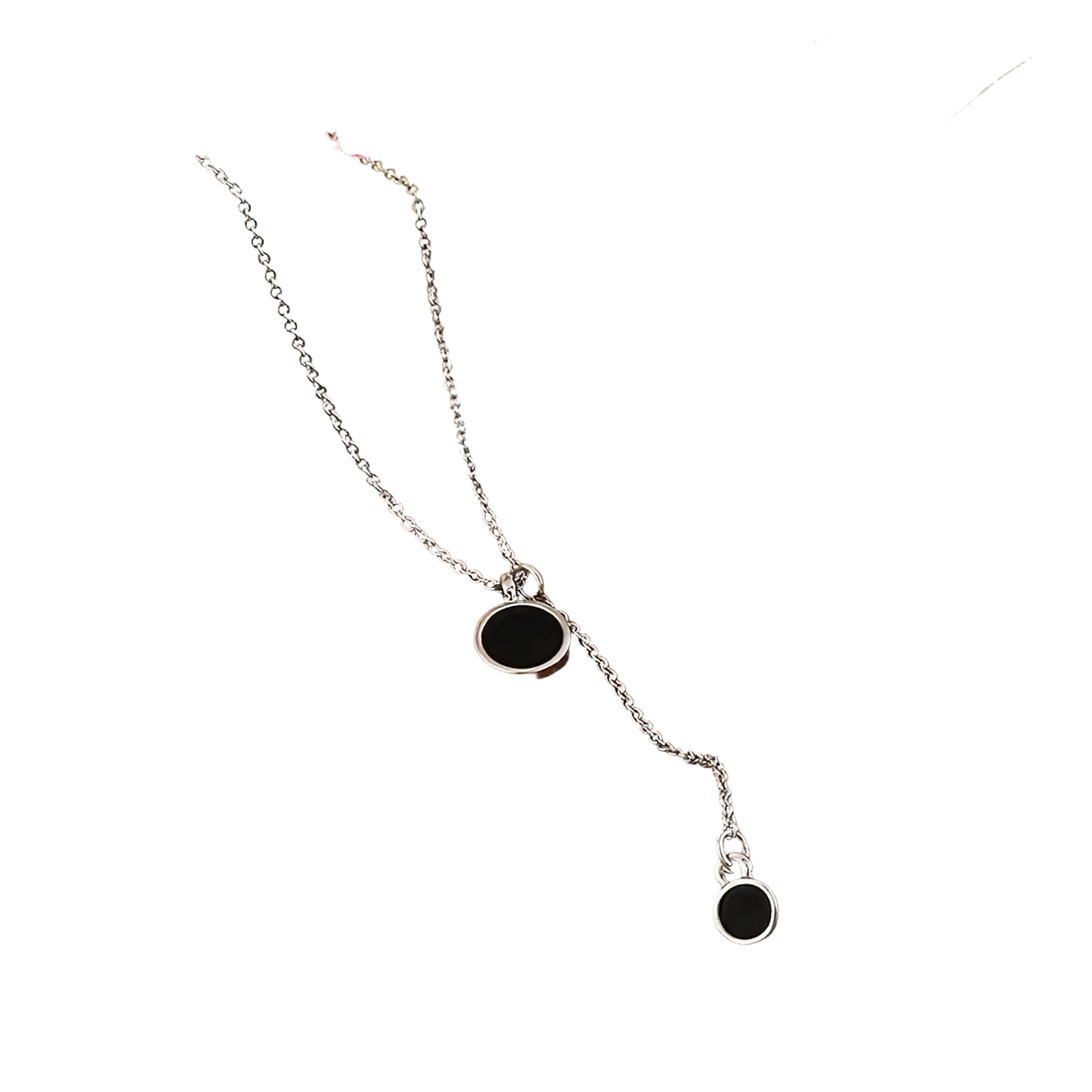 Sterling silver necklace with two black circular pendants featuring a delicate minimalist design