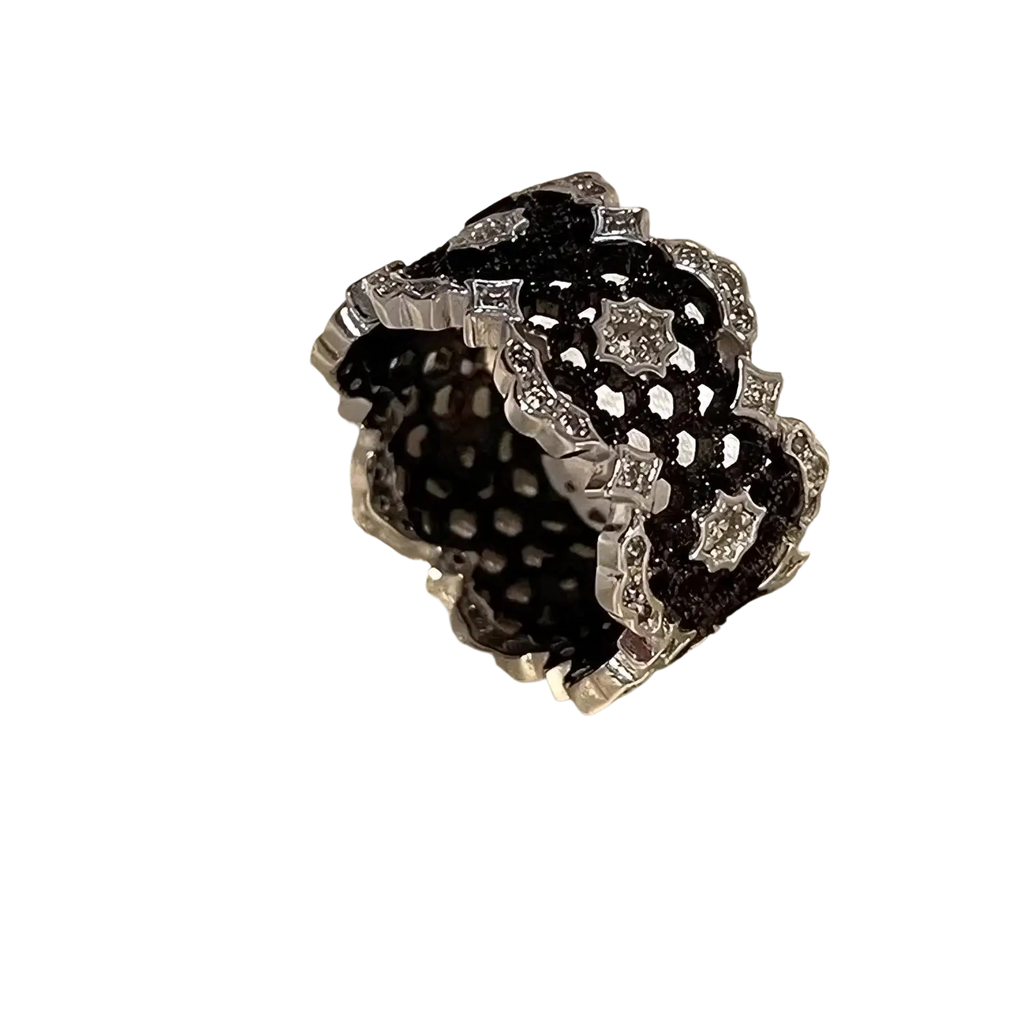 Sterling silver black geometric ring for women with intricate lace-like design and sparkling clear stones