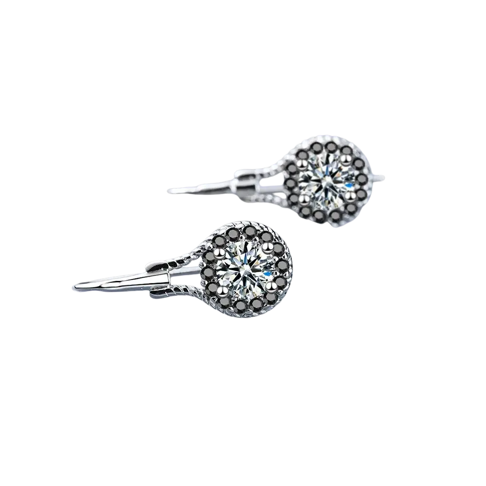 Sterling silver stud earrings with a round brilliant clear stone surrounded by dark gray marcasite stones