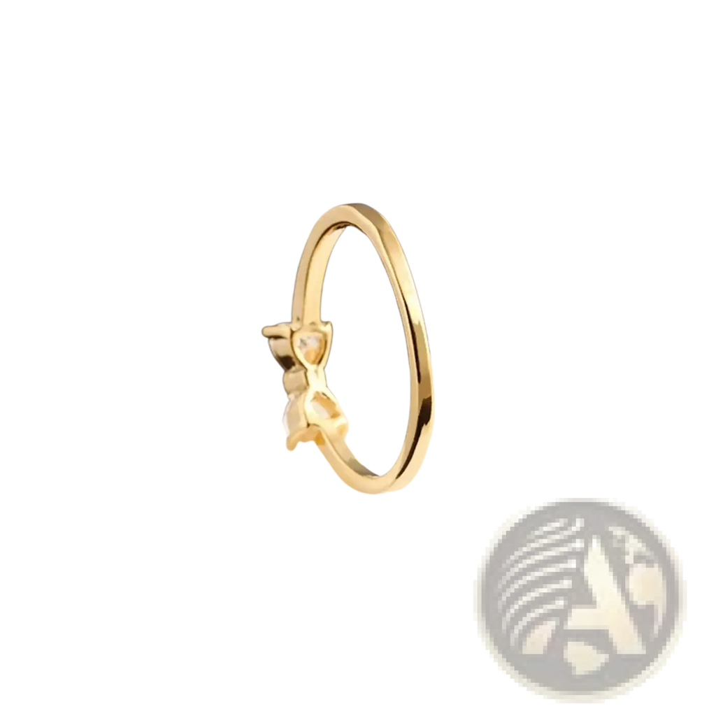 Sterling silver gold-toned wedding band with a delicate bow design featuring a central clear cubic zirconia gemstone