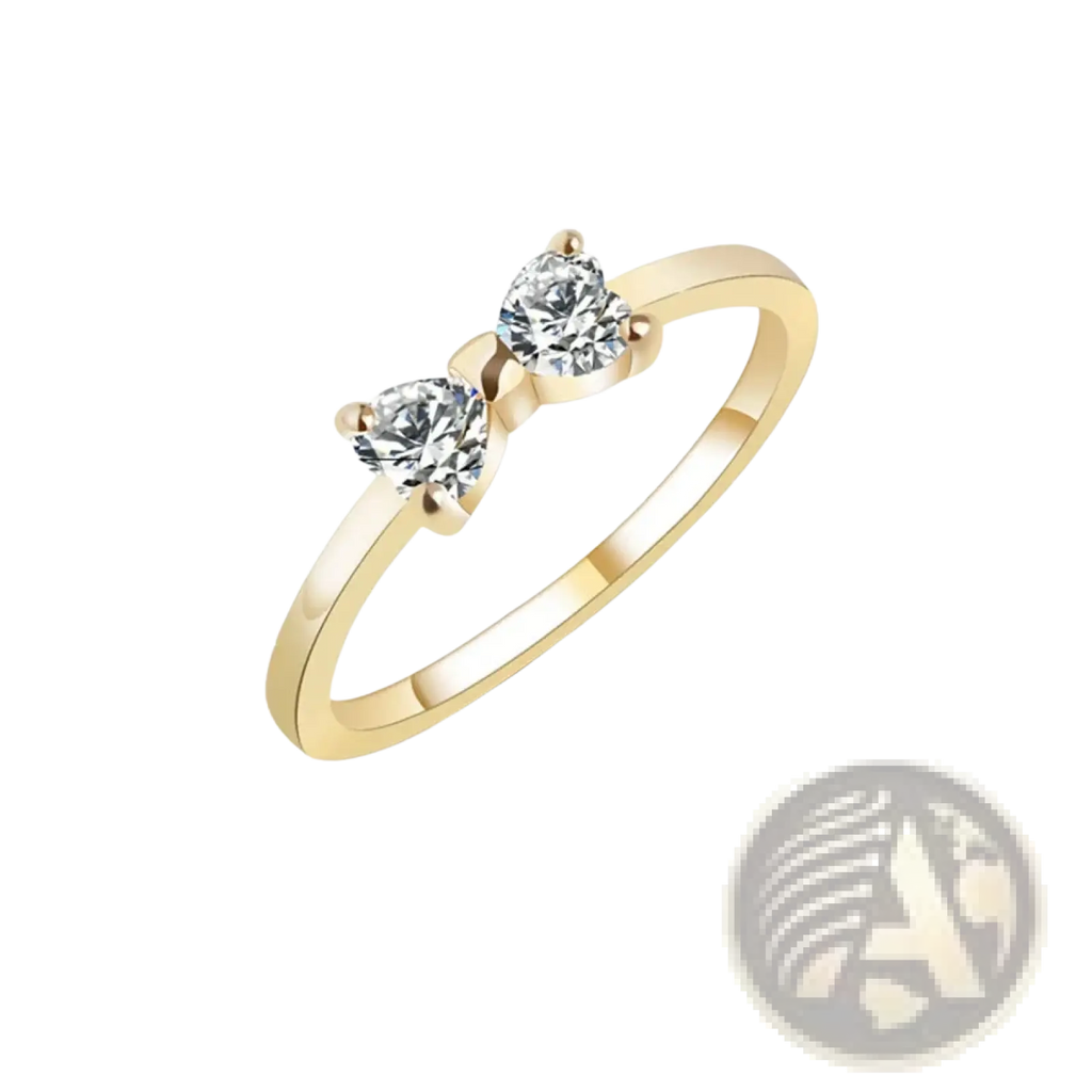 Sterling silver bow cubic zirconia wedding band in gold tone featuring two sparkling zircon stones in a delicate design