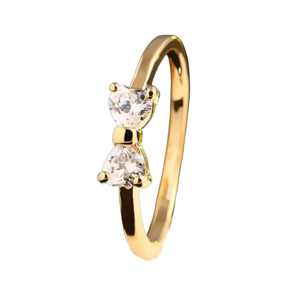 Sterling silver bow cubic zirconia wedding band in gold tone with two clear heart-cut crystals in a delicate design