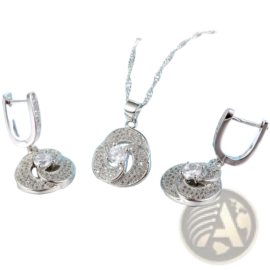 Sterling silver crystal bridal jewelry set with swirling diamond-encrusted pendant and matching hoop earrings