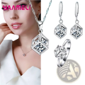 Sterling silver cube pendant necklace with clear zirconia stones in a modern geometric faceted design