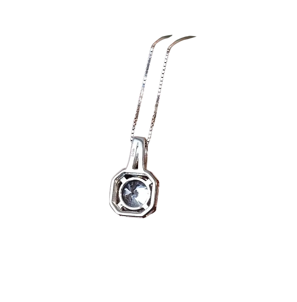 Sterling silver cubic zirconia halo pendant necklace with clear gemstone in octagonal frame on delicate chain