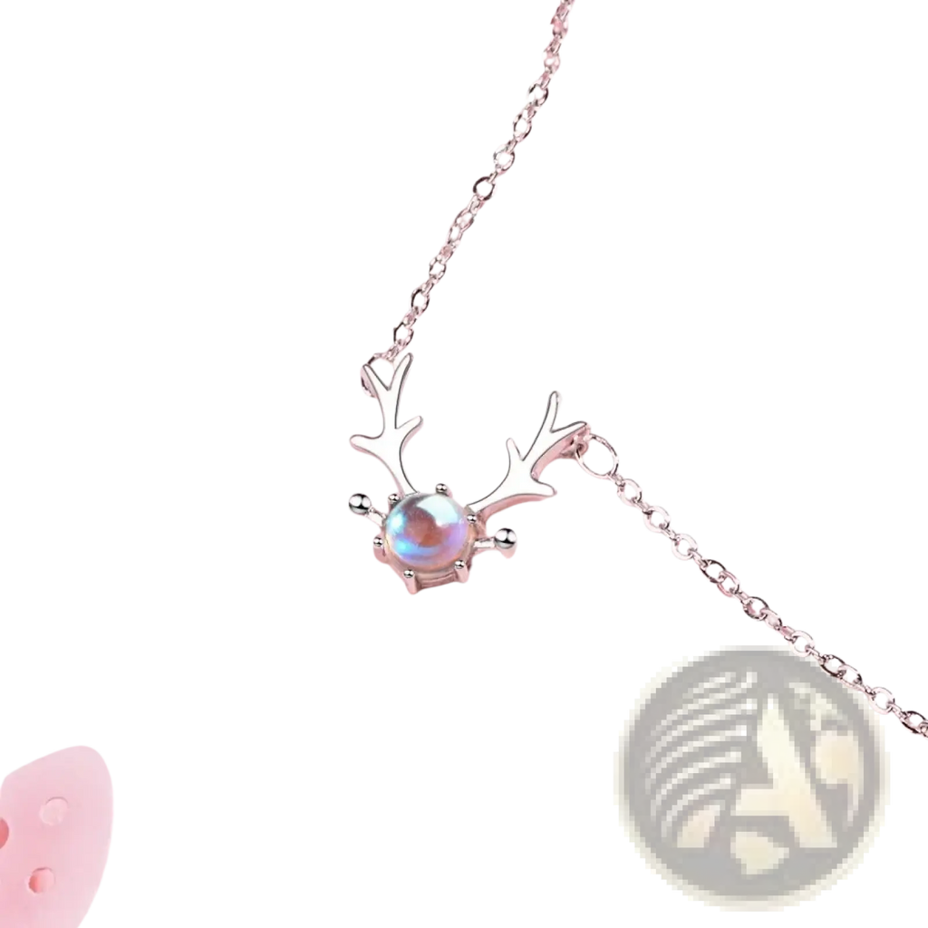 Sterling silver deer antler necklace featuring a central iridescent moonstone pendant in silver tone