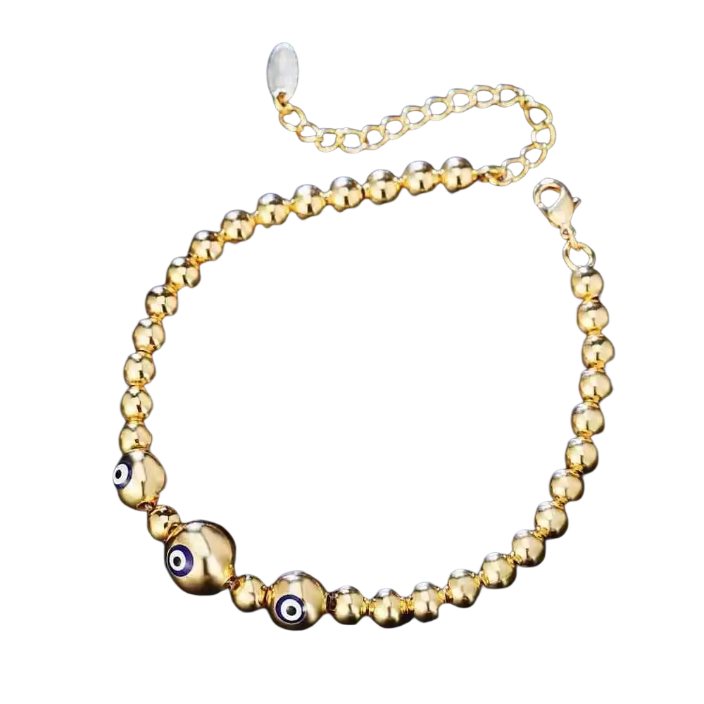 Gold-colored sterling silver beaded bracelet for women featuring three blue and black evil eye charm accents