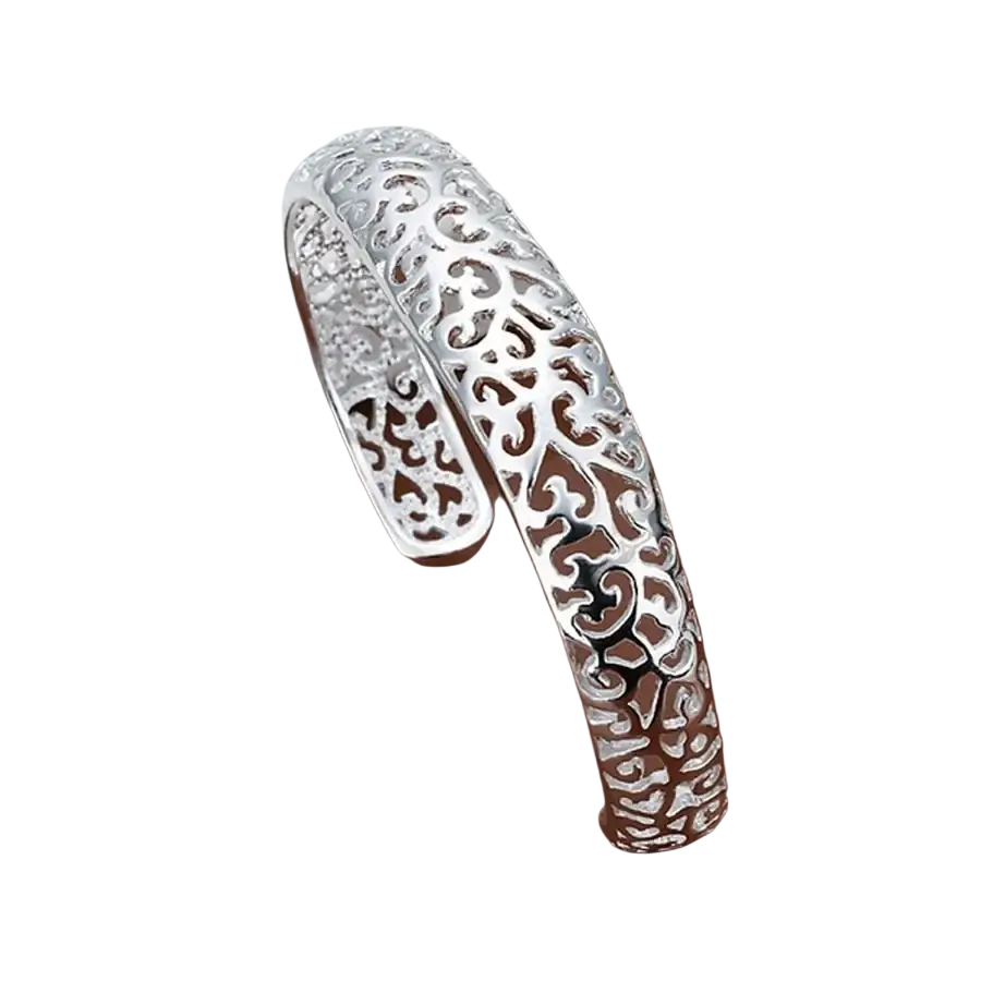 Sterling silver filigree cuff bracelet featuring an intricate open-ended bangle design in silver tone