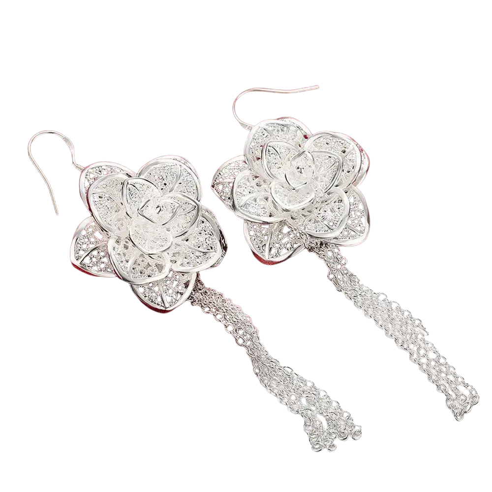 Elegant sterling silver flower earrings featuring intricate filigree design with delicate chain tassels