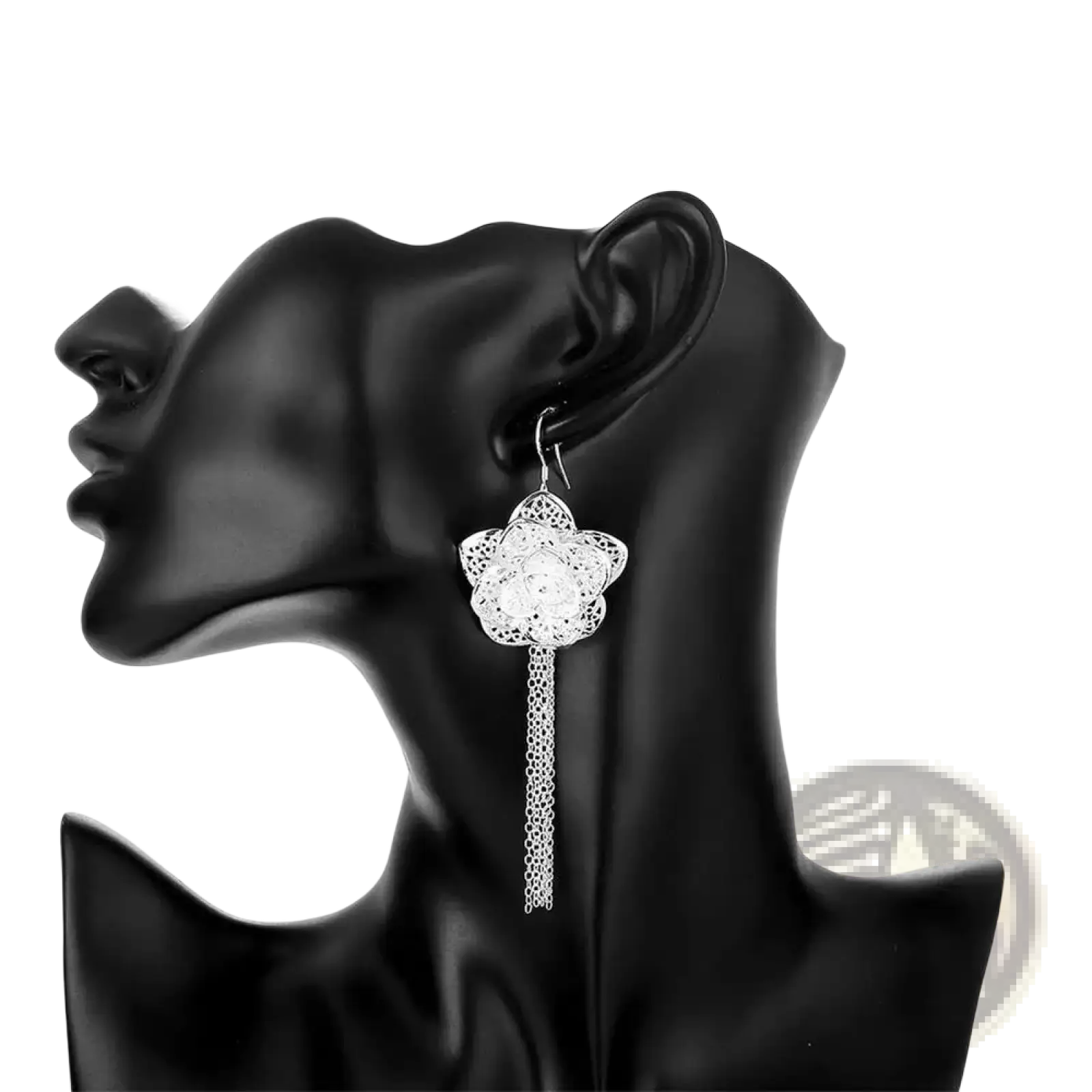 Sterling silver flower earring with intricate filigree design and dangling chain from a sterling silver jewelry set
