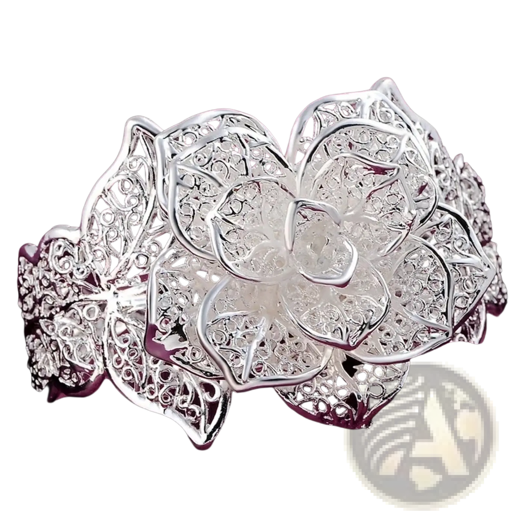 Sterling silver flower cuff bracelet with intricate lace-like filigree detailing and sparkling embedded stones