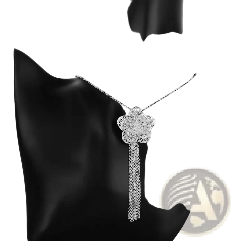 Sterling silver flower pendant necklace with delicate chain and dangling tassel in a silver filigree jewelry set