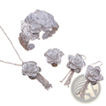 Sterling silver flower jewelry set featuring silver filigree rose design with intricate lace detailing and chain tassels