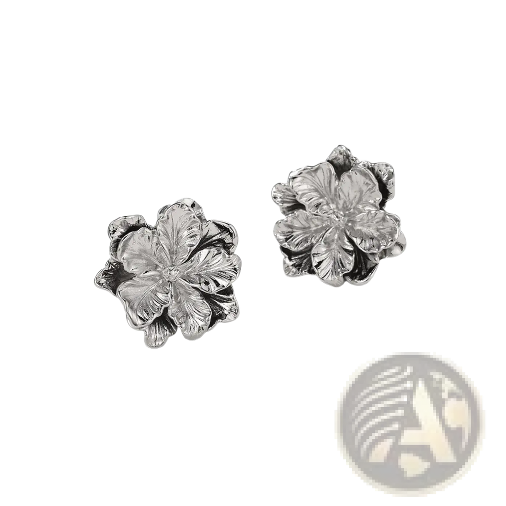 Sterling silver flower stud earrings with detailed petal textures and a polished metallic finish