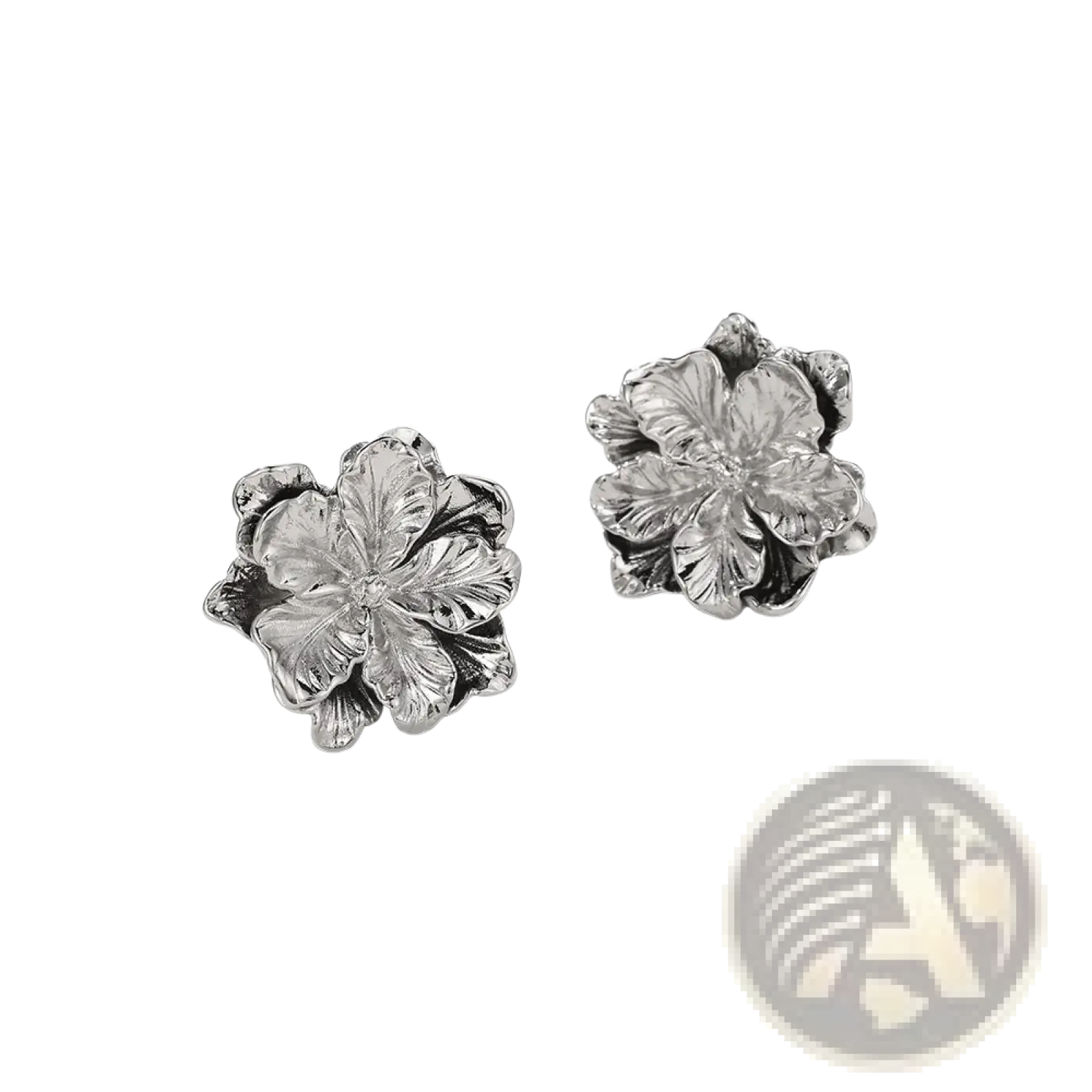 Sterling silver flower stud earrings with detailed petal textures and a polished metallic finish