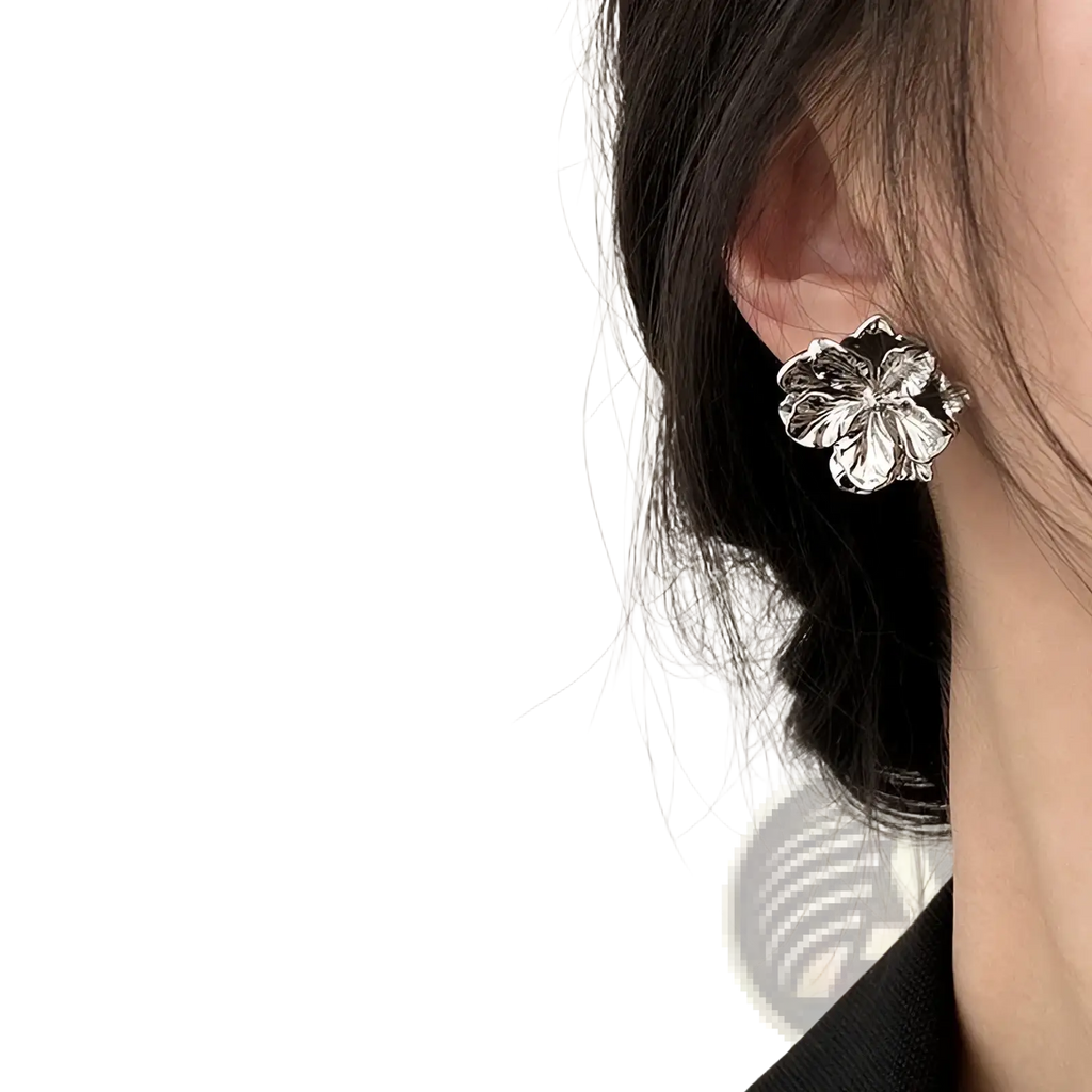 Sterling silver flower stud earring in silver with detailed petal design perfect for elegant everyday wear