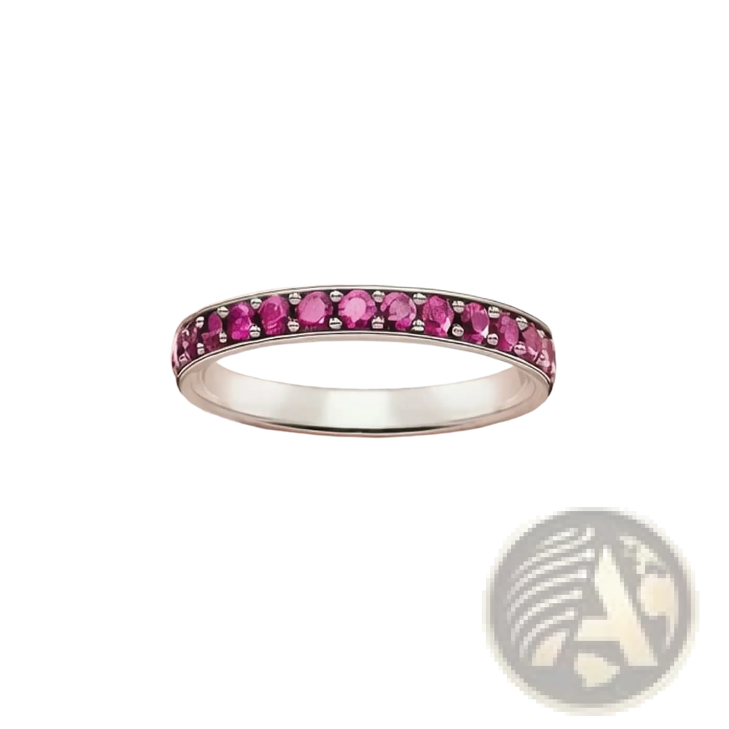 Sterling silver stacked ring featuring a delicate band adorned with a continuous row of vibrant pink gemstones