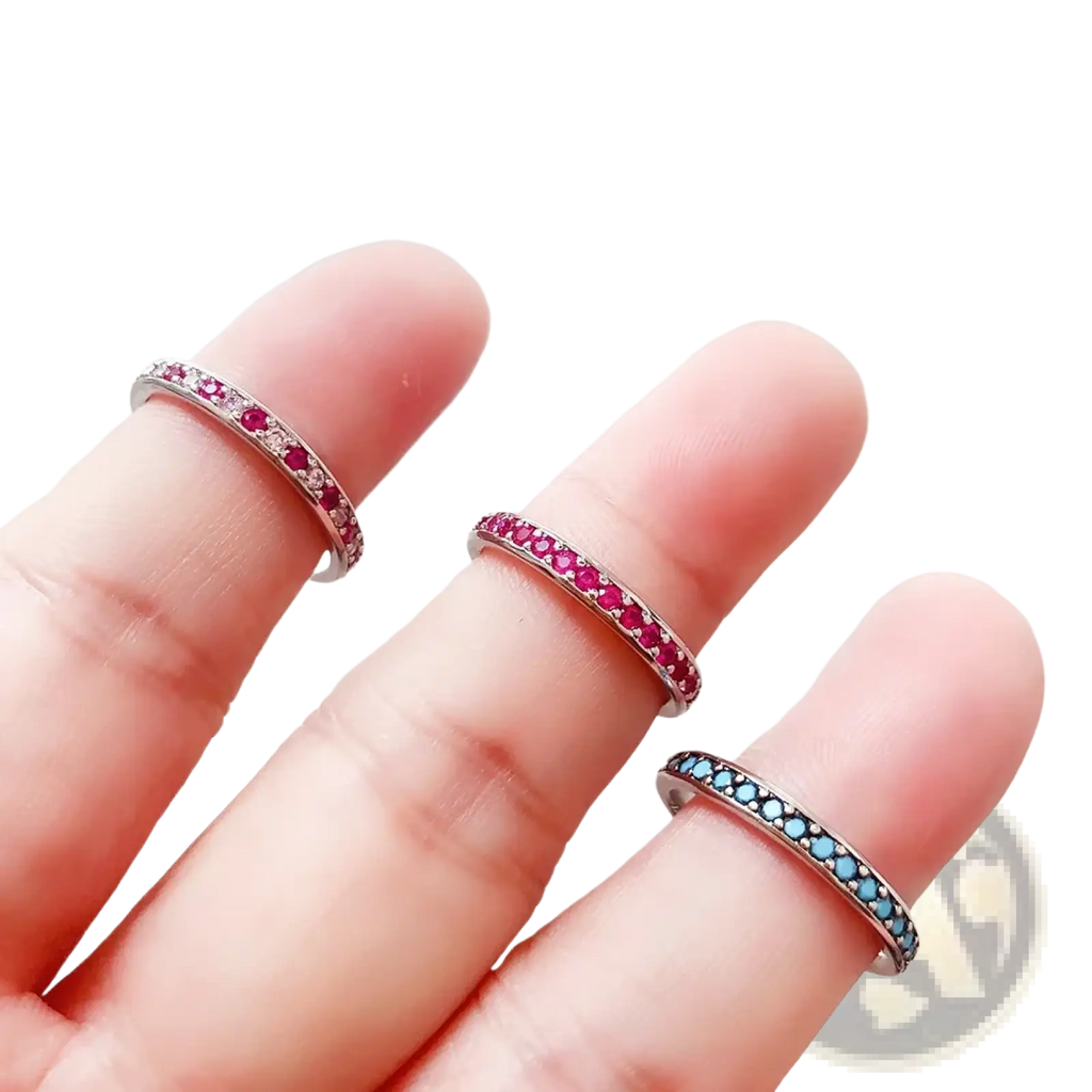Sterling silver gemstone stacked ring with three delicate bands featuring ruby red and blue turquoise stones with diamonds