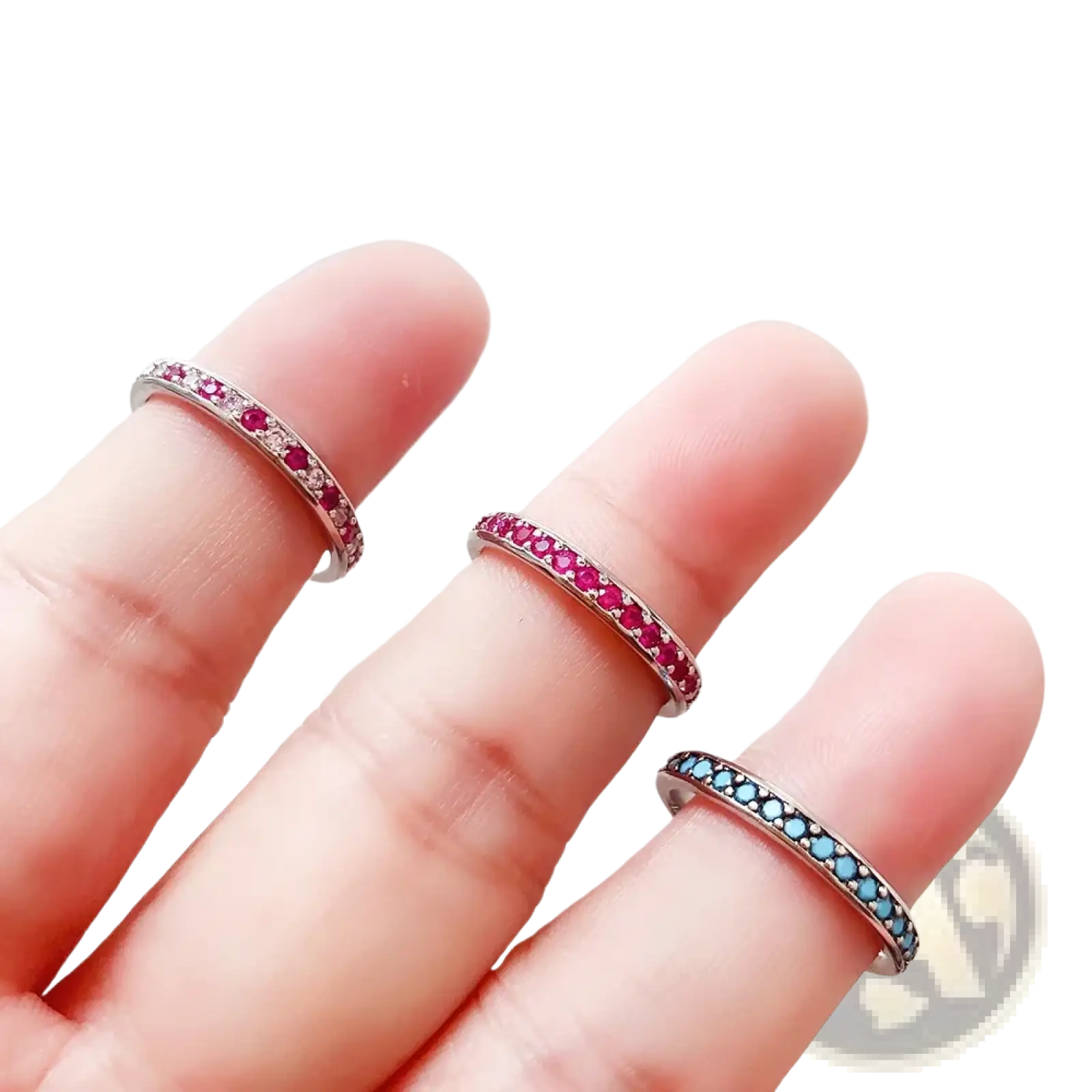 Sterling silver gemstone stacked ring with three delicate bands featuring ruby red and blue turquoise stones with diamonds
