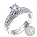 Sterling silver halo wedding ring set with a sparkling round-cut diamond and intricate diamond-paved band marked s925