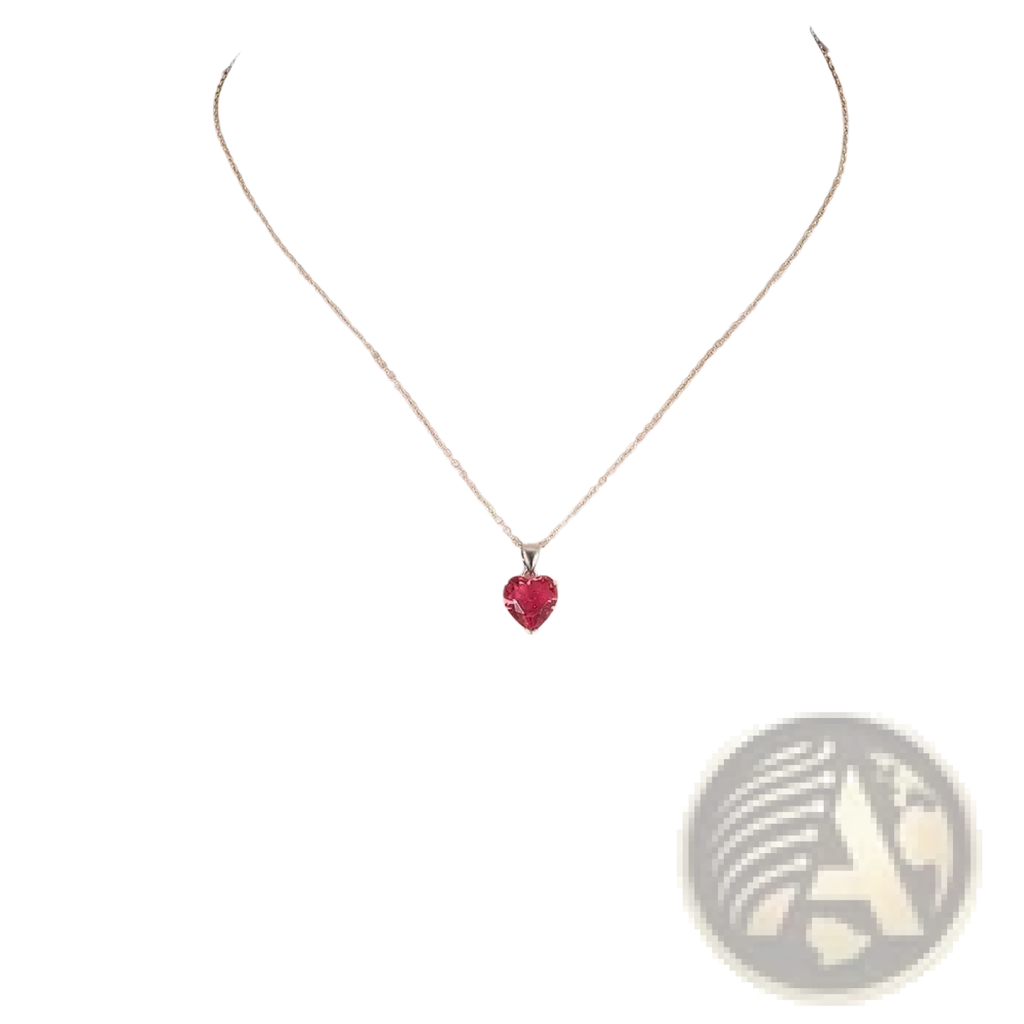 A delicate sterling silver chain necklace with a vibrant red heart-shaped zircon pendant from a jewelry set