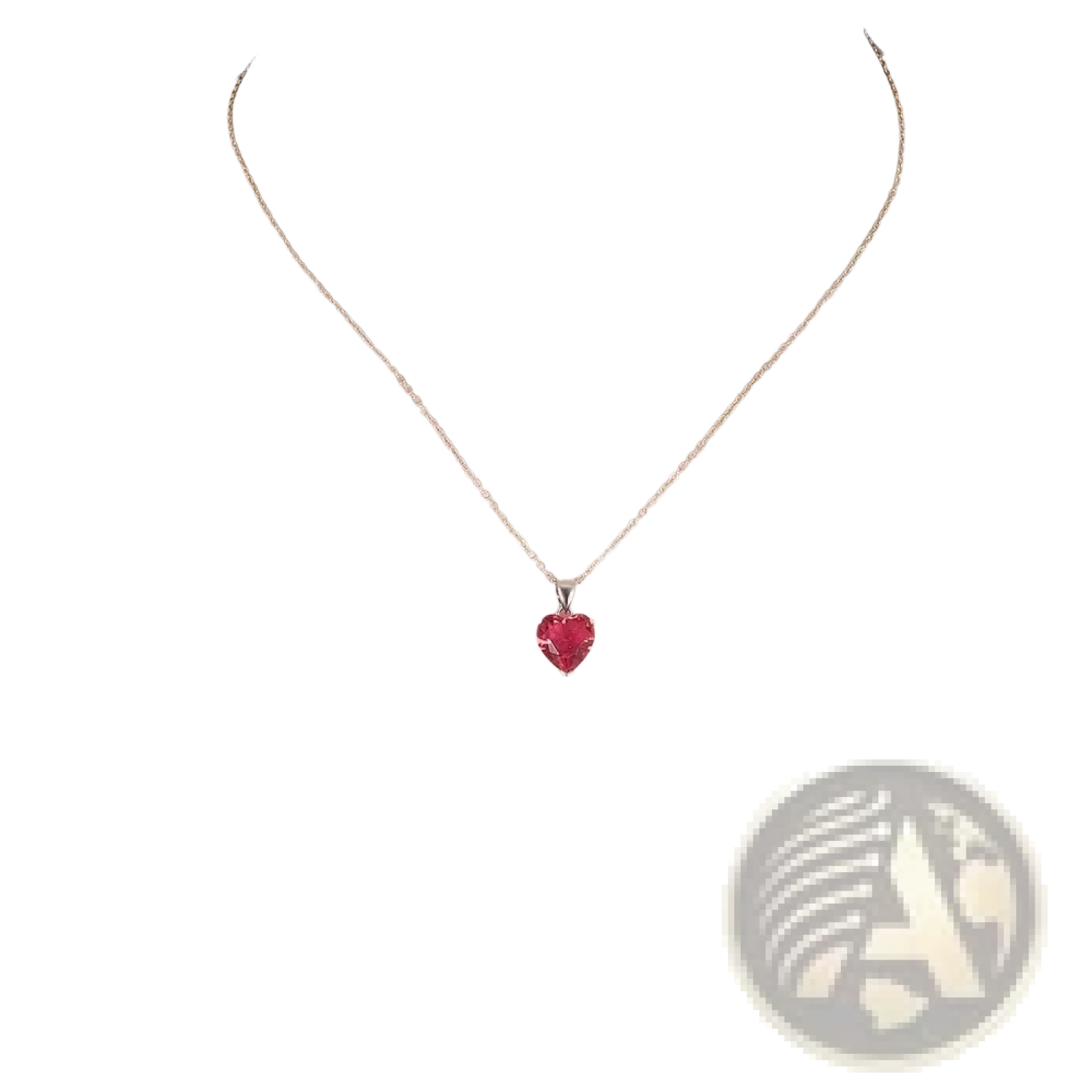 A delicate sterling silver chain necklace with a vibrant red heart-shaped zircon pendant from a jewelry set