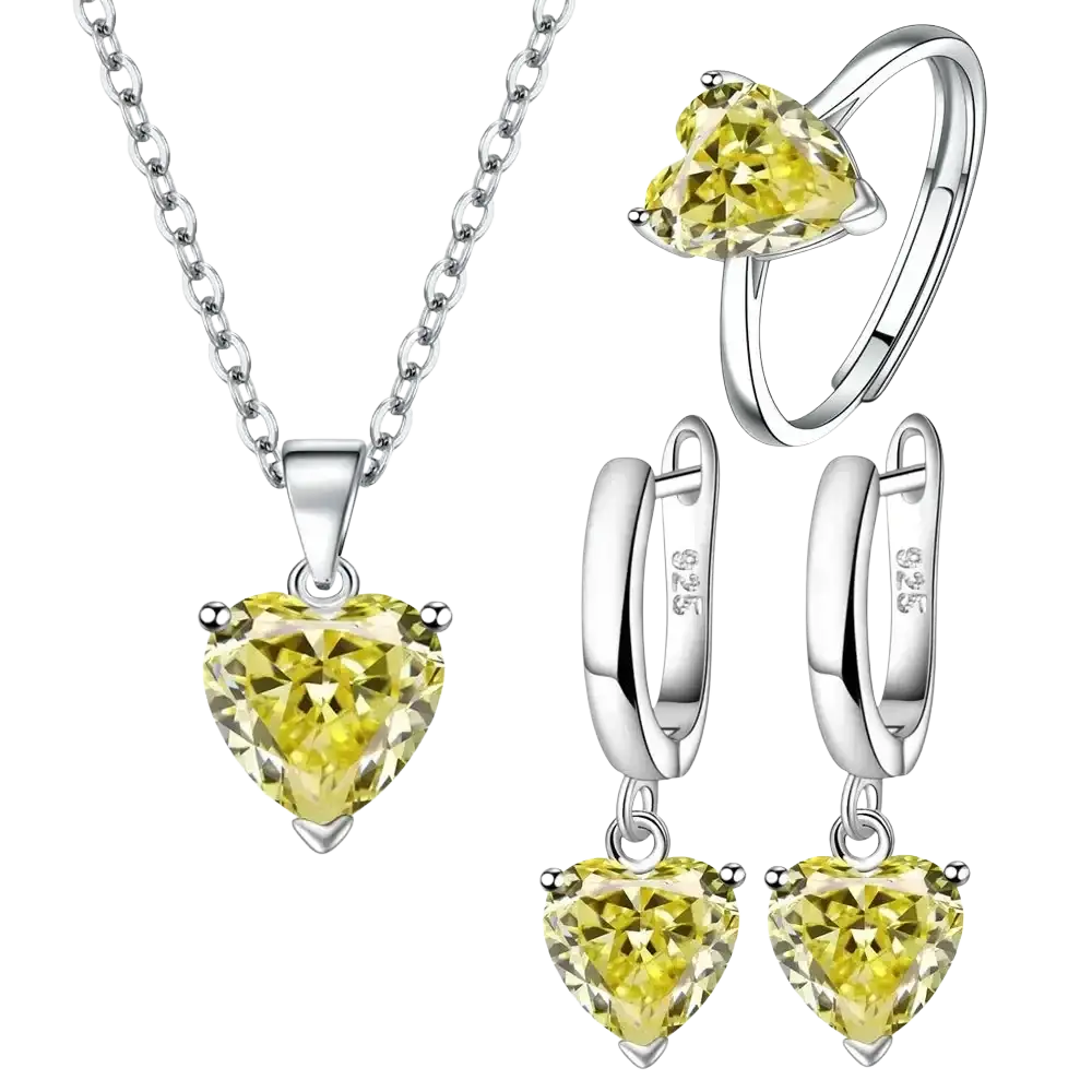 A sterling silver heart jewelry set with yellow zircon gemstones including a necklace ring and hoop earrings