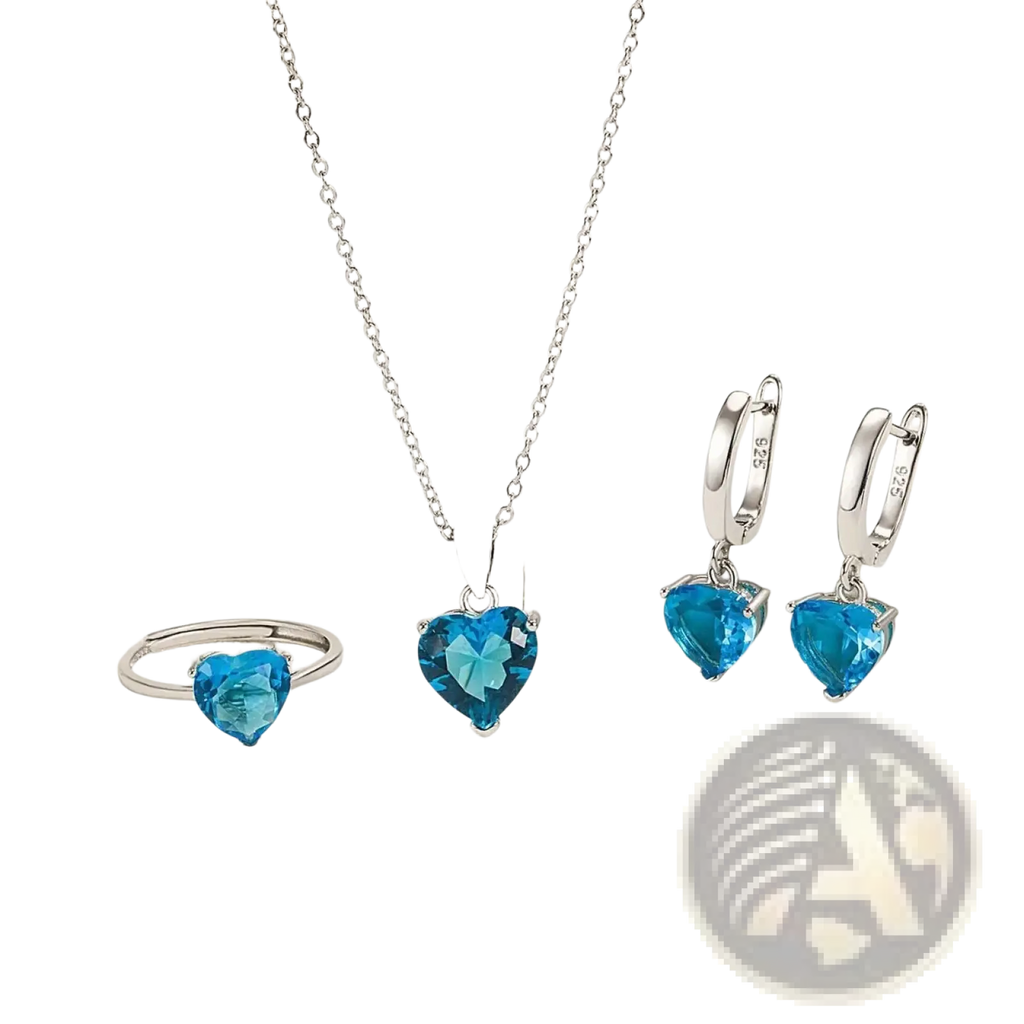Sterling silver heart jewelry set with vibrant blue zircon huggies including necklace, hoop earrings, and ring